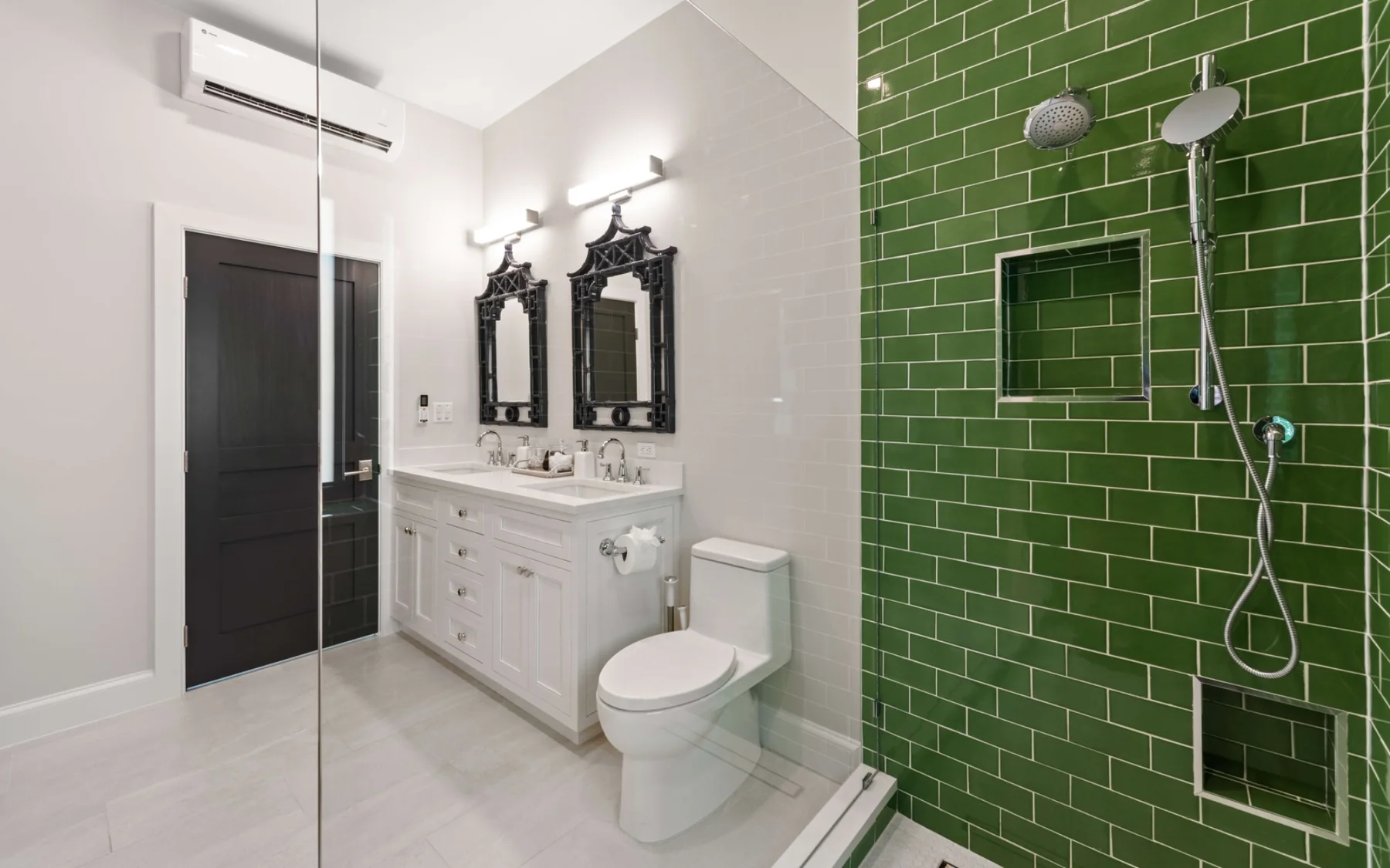 Bathroom with green tiled walk-in shower